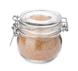 Brown sugar in glass jar isolated on white
