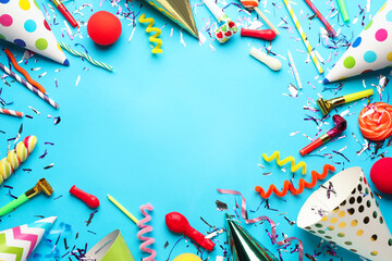 Beautiful flat lay composition with festive items on light blue background, space for text. Surprise party concept