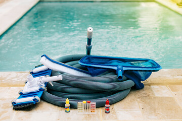 Pool cleaning and maintenance tools, image of pool cleaning and maintenance kit, vacuum cleaner, ph...
