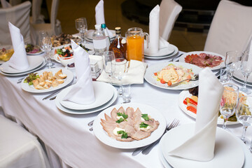 served festive table in a restaurant, close-up