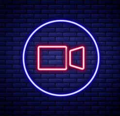 Glowing neon line Video chat conference icon isolated on brick wall background. Online meeting work form home. Remote project management. Colorful outline concept. Vector