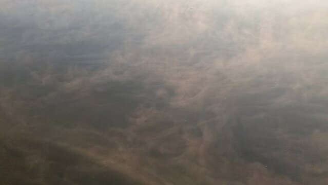 misty lake the morning of the reservoir With yellow sunlight, Ban Rak Thai, Mae Hong Son, Thailand