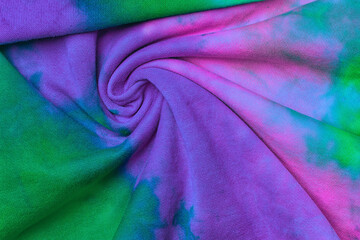 Abstract tie dye neon multicolor folded fabric cloth boho pattern texture for background, sale...