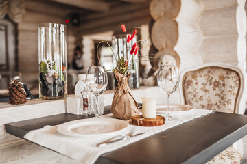 Luxury table setting for couples dining in a restaurant in pastel colors close up