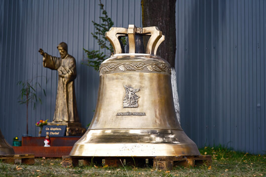 Minsk, Belarus. Sep 2018. Church Bell of St. Michael the Archangel near  Church of St. Simeon and St. Helena, ready to mount into bell tower. Production of Church Bells - Jan Felczynski Bell Foundry