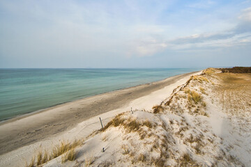 Fototapeta na wymiar high dune on the darss. Viewpoint in the national park. Beach, Baltic Sea, sky and sea.