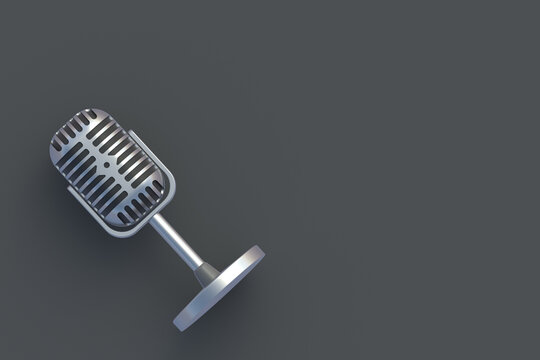 Vintage metallic microphone on gray background. Radio broadcast. Online interview. Audio recording equipment. New song. Song recording. Karaoke bar. Top view. Copy space. 3d render