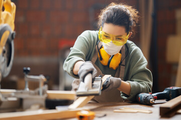 woman carpenter in workshop