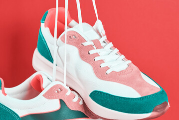 Flying trendy sneakers on creative colorful background, Stylish fashionable minimalism concept,...