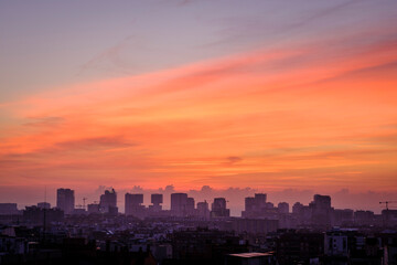 Fototapeta na wymiar View of the city of Barcelona (Spain) in an autumn sunrise.