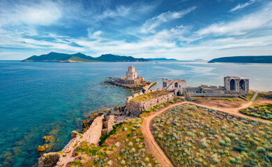 Picturesque summer view from flying drone of old Methoni Castle. Aerial seascape of Ionian sea....
