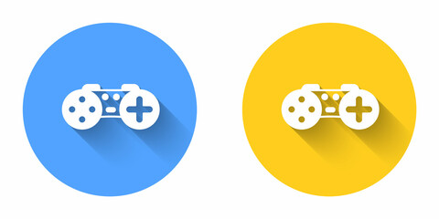 White Gamepad icon isolated with long shadow background. Game controller. Circle button. Vector