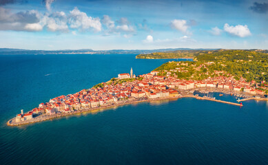 Old coastal Piran town. Splendid outdoor scene of Slovenia’s Adriatic coast with beautiful Venetian architecture. Beautiful Mediterranean seascape. Traveling concept background..