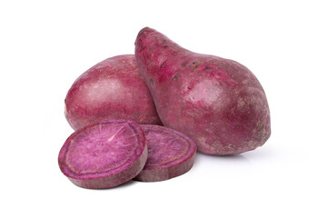 Fototapeta premium Purple sweet potatoes with slices isolated on white background.