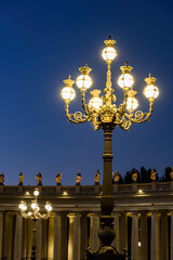Fototapeta na wymiar Ornate Lamp On St Peter Square In Vatican