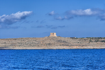 Fototapeta na wymiar Comino Island With St Mary Tower In Malta