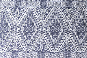 Indigo woodcut seamless ethnic geometric pattern closeup