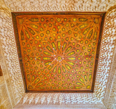 Stellar pattern on ceiling of Patio of Gilded Room, Nasrid Palace, Alhambra, on Sept 25 in Granada, Spain