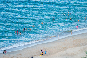 Obraz premium People swimming on the Nha Trang beach