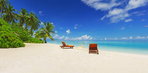 Great beach panorama in Maldives. Vacation on a dream island at the ocean.