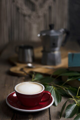 a cup coffee and moka with milk jug
