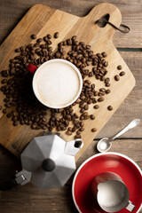 Fototapeta na wymiar a cup coffee and moka with milk jug