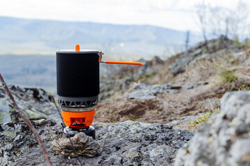 Mobile emergency cooking system, camping equipment, extreme hiking in the mountains, kettle for...