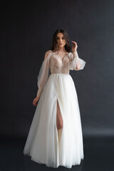 Fototapeta premium Beautiful bride perfect style. Wedding hairstyle make-up luxury wedding dress