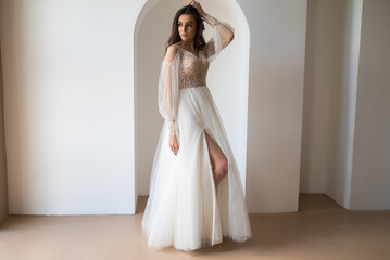 Fototapeta premium Beautiful bride perfect style. Wedding hairstyle make-up luxury wedding dress