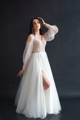 Fototapeta premium Beautiful bride perfect style. Wedding hairstyle make-up luxury wedding dress