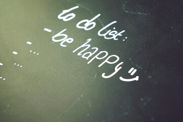 Motivational image about happiness as the most important thing in a to do list