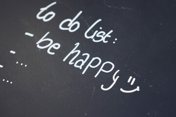 Motivational image about happiness as the most important thing in a to do list