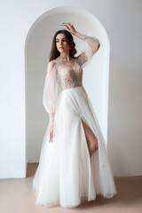 Fototapeta premium Beautiful bride perfect style. Wedding hairstyle make-up luxury wedding dress