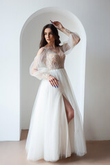 Fototapeta premium Beautiful bride perfect style. Wedding hairstyle make-up luxury wedding dress