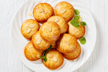 almond cookies on white plate, top view
