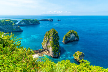 Interesting view of a collection of small islands near the Atuh Raja Lima shrine on Nusa Penida, Indonesia.