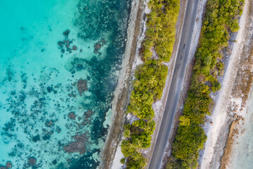 Aerial view of tropical beach landscape and local road at addu city, the southernmost atoll of Maldives in Indian ocean. Maldives tourism and summer vacation concepts
