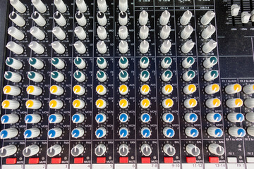 Close up of music equipment for sound mixer control, electronic device. DJ control panel