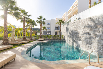 Sea hotel resort with swimming pool in the morning