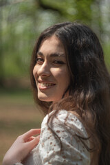 Fototapeta premium portrait of a young long hair woman smiling