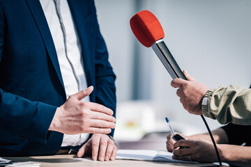 Journalist Interview. Speaker Answering Questions.