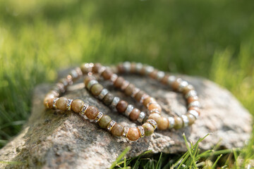 Two bracelets made of natural jasper stones beads. Handmade jewelry. Woman exoteric accessories. Talismans and amulets.