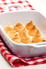 coconut meringues in baking plate