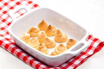 coconut meringues in baking plate