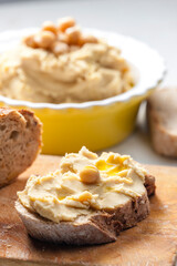 still life of hummus with bread