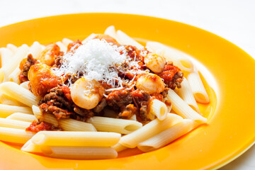 pasta penne with minced beef meat and white beans