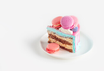 piece of cake with pink and blue decor on white plate