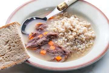 beef broth with carrot and barley groats