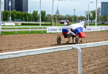 test of trotting horses on the racetrack at the hippodrome