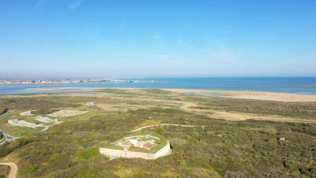 The redoubt of Merville facing the bay of the Orne in Europe, France, Normandy, Arromanches, in spring, on a sunny day.